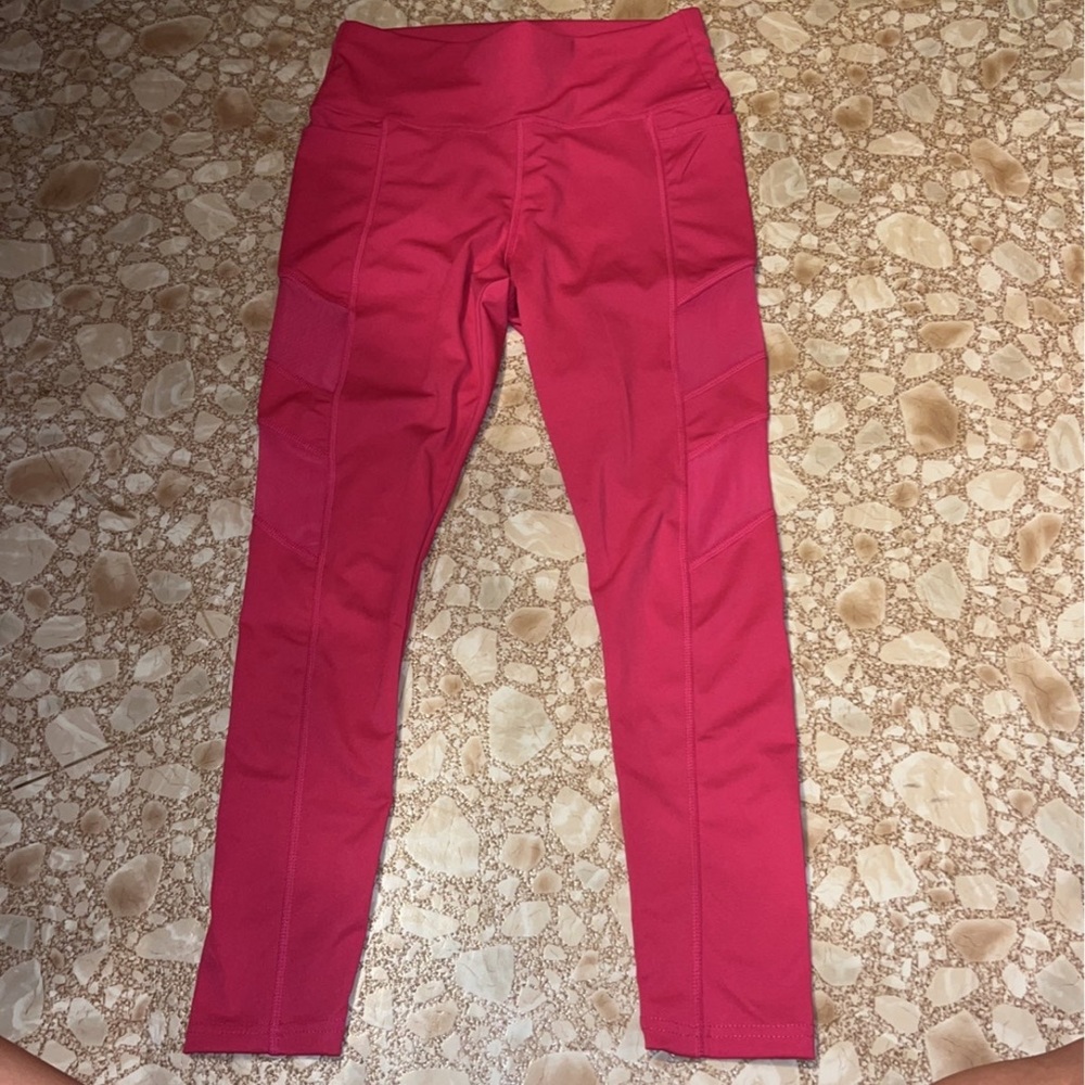 Pink leggings size small with mesh sides